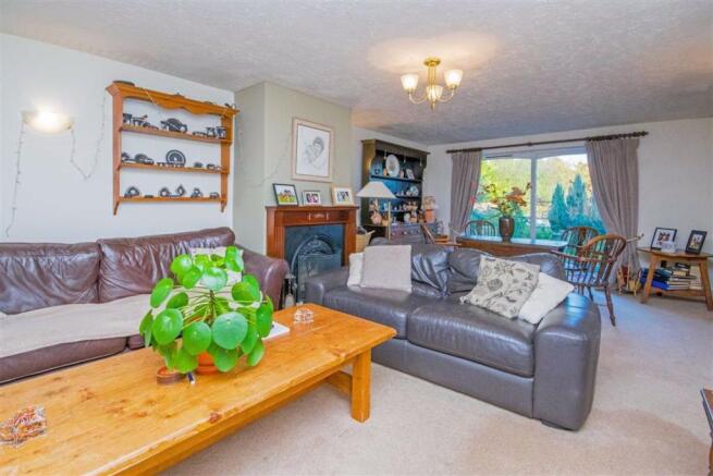 THROUGH LOUNGE/DINING ROOM