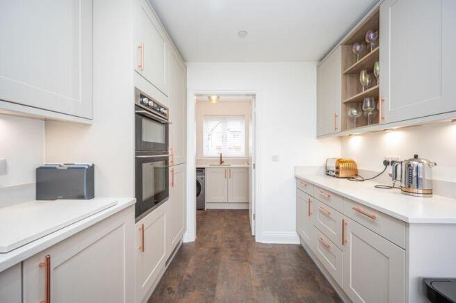 Kitchen through to Utility