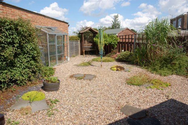SIDE AND REAR GARDEN