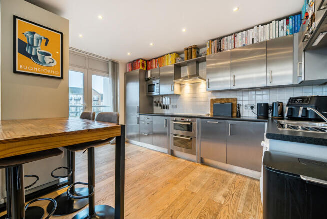 1409953-4-698b038...