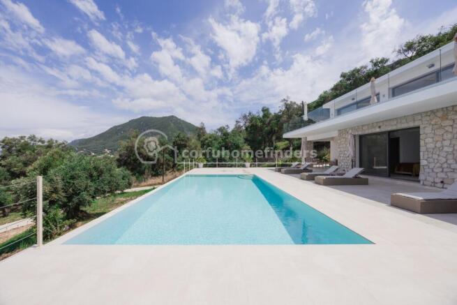 Pool terrace and villa