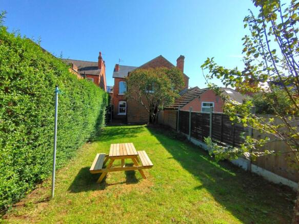 Sunny private garden with picnic seating...