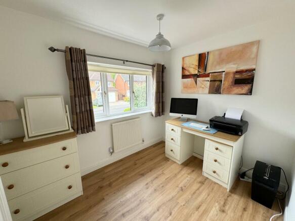 BEDROOM (FRONT)