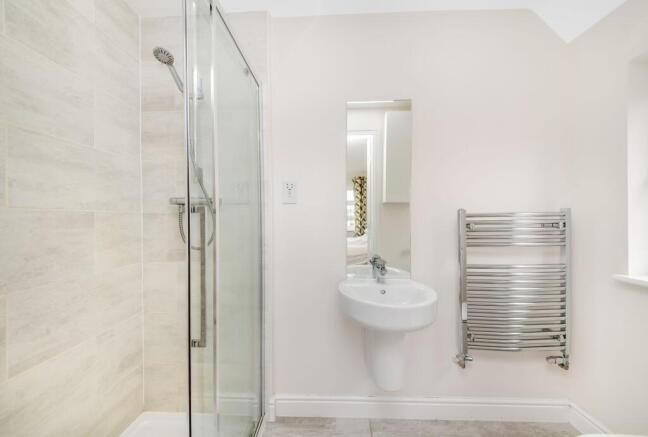 BEDROOM ONE EN-SUITE SHOWER ROOM