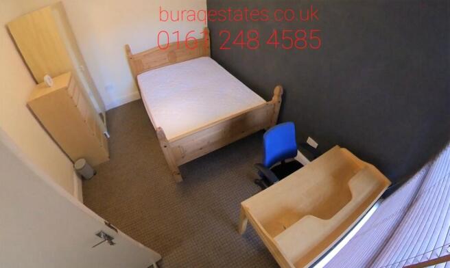 Neat furnished single bedroom with a single bed...