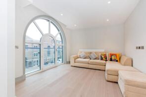 Flat 211, Ivory House, Clove Hitch Quay, London SW11 3FA