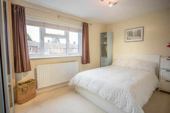 Bedroom 2 with wardrobes