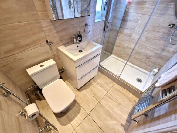 Modern and well-maintained bathroom featuring a...