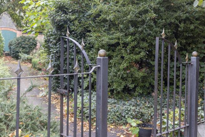 GATED FRONT GARDENS