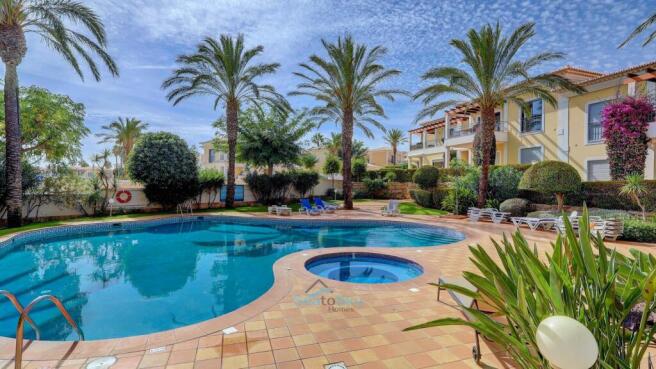 adjacent to pool & jacuzzi