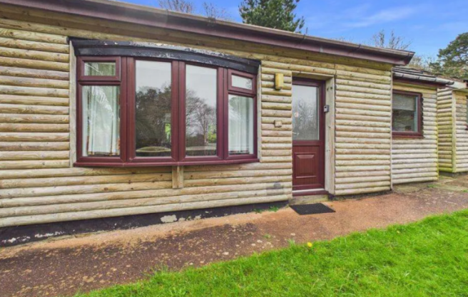 Exterior Of The Woodland View Lodge For Sale At Wa