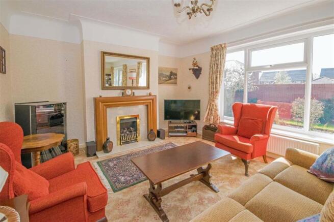 THROUGH LOUNGE/DINING ROOM