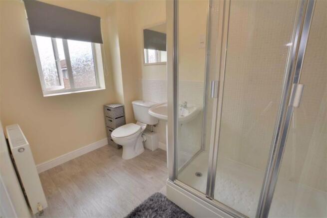 EN-SUITE SHOWER ROOM