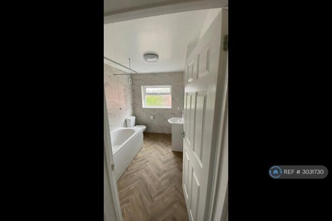 Bathroom. With Electric Shower Above Bath