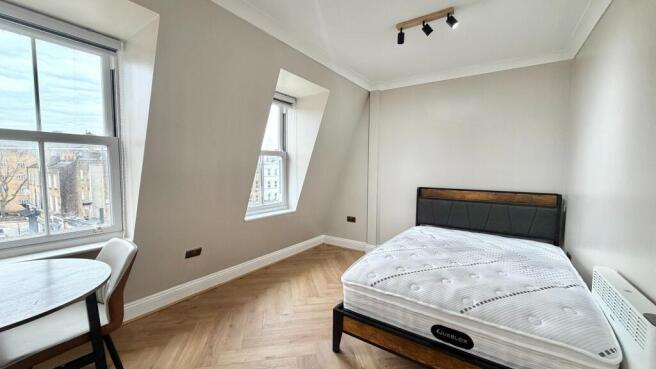 Bright, freshly decorated double bedroom with l...
