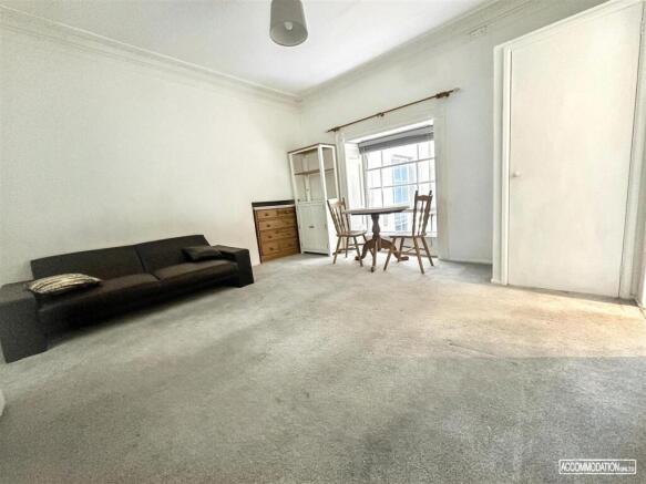 Spacious living area with bright natural light...