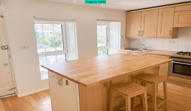 Kitchen with Island with Seating both Sides