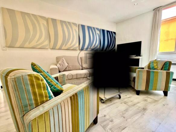 Bright and inviting living room with colorful stri