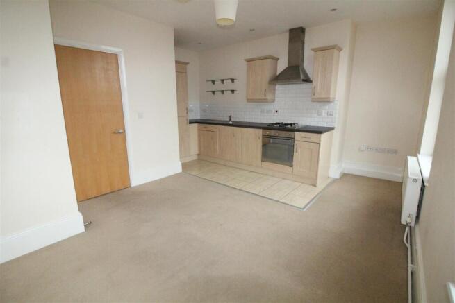 LOUNGE WITH KITCHEN AREA