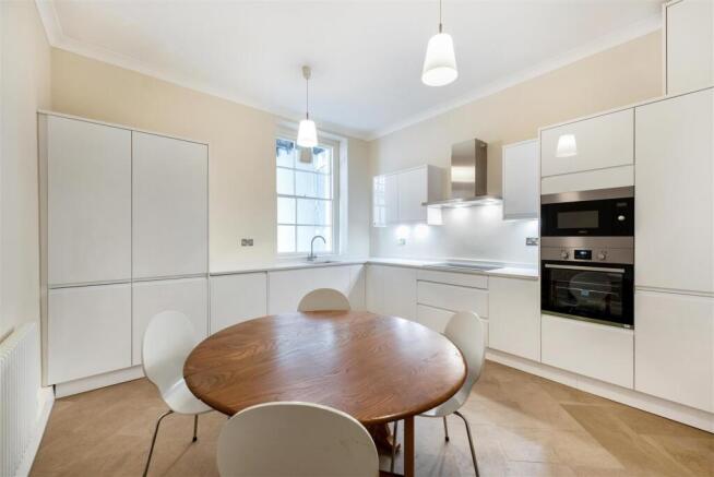large dining room table in bright kitchen.jpg