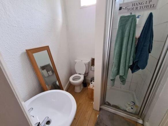 A clean and well-maintained bathroom featuring ...