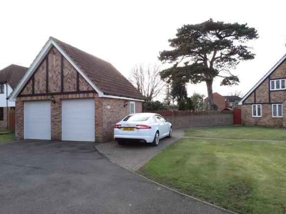 Double Garage and Front Garden