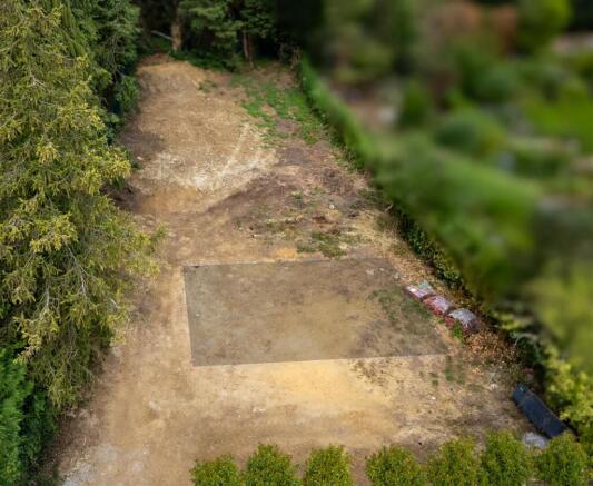 Plot East to West, showing indicative house area.j