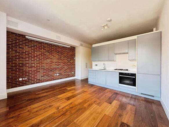 Reception/kitchen/dining area
