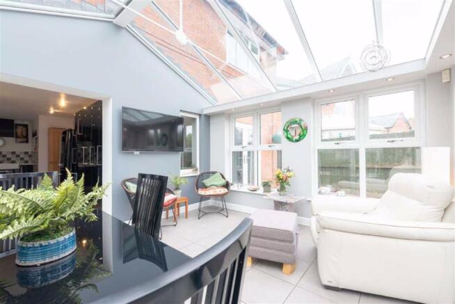 KITCHEN OPEN TO ORANGERY