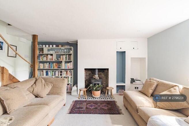 Feature Fireplace With Solid Fuel Wood Burner.
