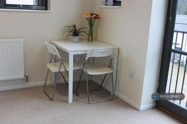 Living Area With Table & Chairs