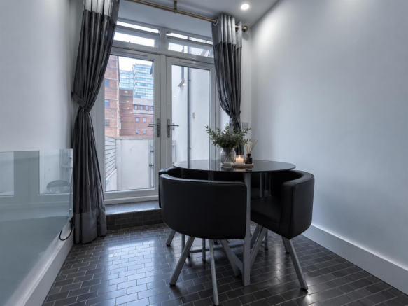 Cool Modern Dining Nook with City Views.png