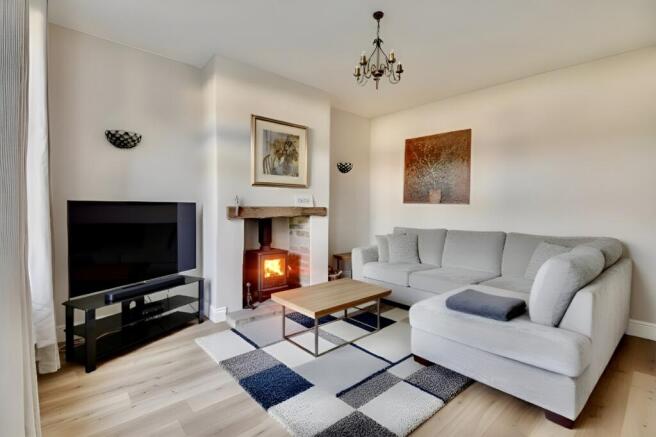 Spacious living room virtually staged