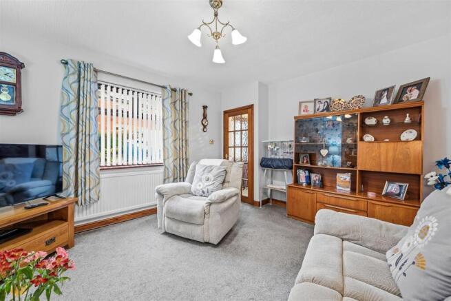 Sitting Room towards entrance lobby.jpg