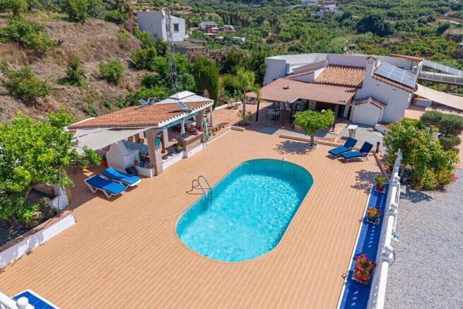 Pool and house