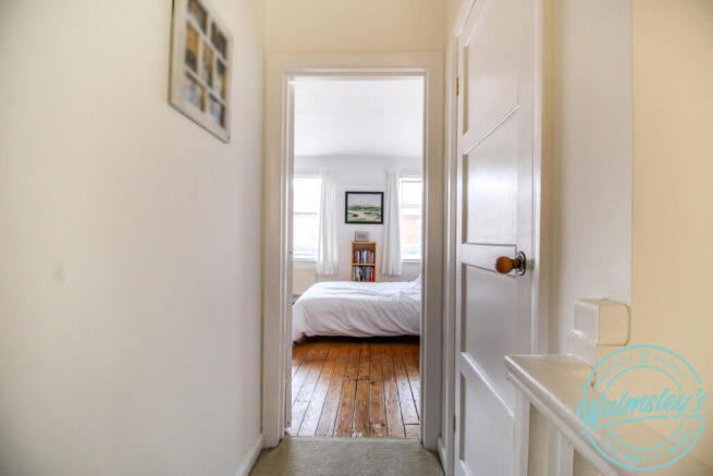 The main bedroom with useful storage on landing