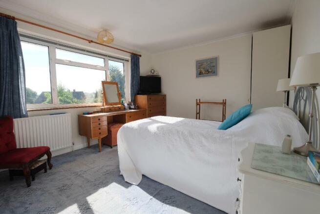 Main bedroom overlooking garden & hills
