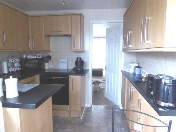KITCHEN/SUN PORCH