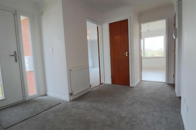 PARTICULARLY SPACIOUS ENTRANCE HALL