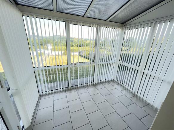 FRONT ENTRANCE CONSERVATORY
