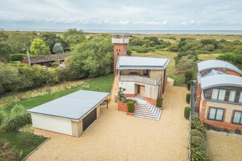 A Four-Bedroom Coastal Home with a Reimagined Period Tower and Panoramic Views