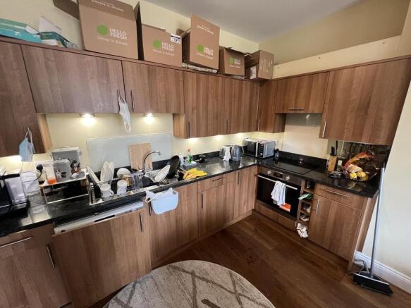 Modern kitchen with stylish wooden cabinets...
