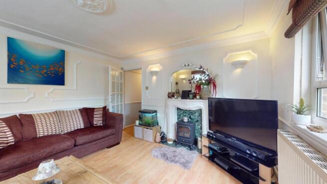 Living room at house for sale at E16, by barrain l