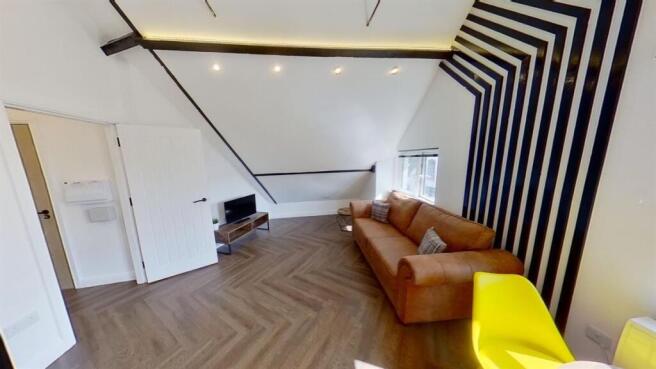 Stylish lounge with unique feature wall design...