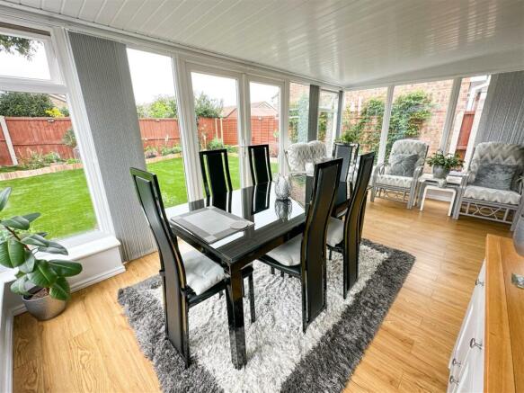 ALTERNATE VIEW OF SITTING/DINING ROOM