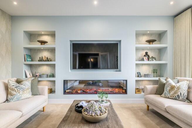 5 bedroom showhome | formal and cosy lounge with fireplace