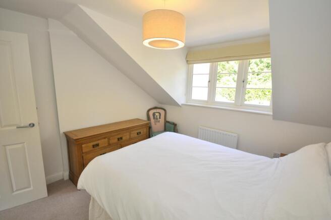 Bedroom three with built in wardrobes