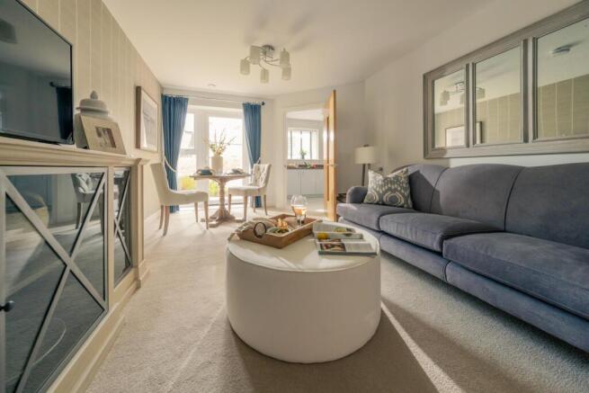 a living room with a couch and a table