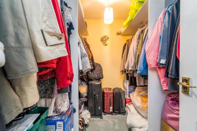 Master bedroom walk in wardrobe