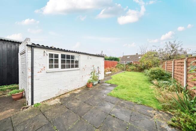 Back garden showing garage